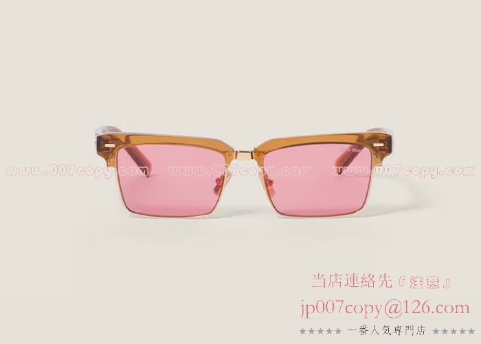MIU MIUオレンジ ラウンド型 サングラス